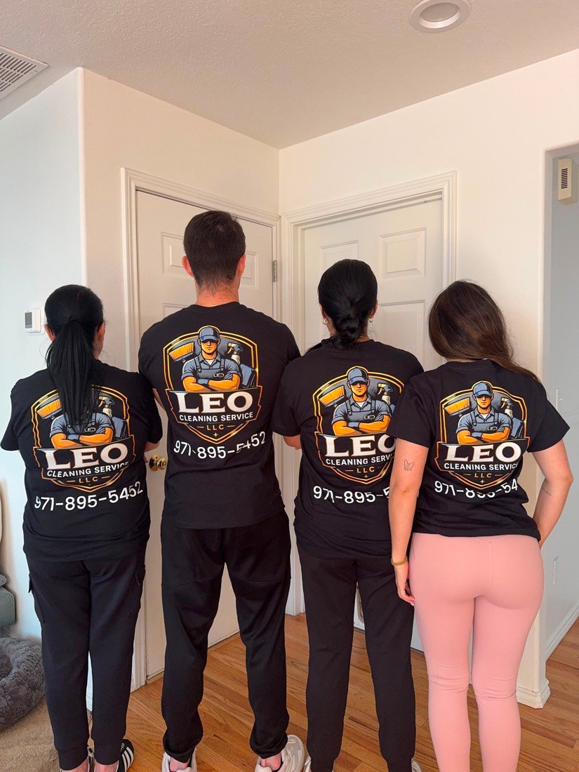 Leo Cleaning Service LLC team in branded uniforms